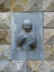 Fountain against historic wall, Cordoba, Andalusia, Spain