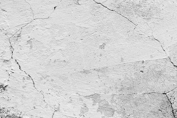 Obraz premium Texture of a concrete wall with cracks and scratches which can be used as a background