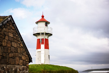 Fototapeta na wymiar Old lighthouse building in Torshavn, Faroe Islands.