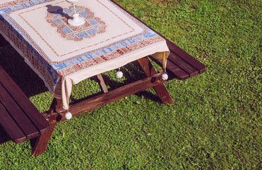 Clip tablecloth weights attached to a table cloth outdoors these are designed to hold your table...