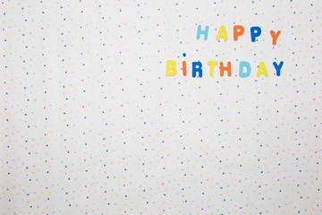 Colorful happy birthday wishes with stars on white background , space for text