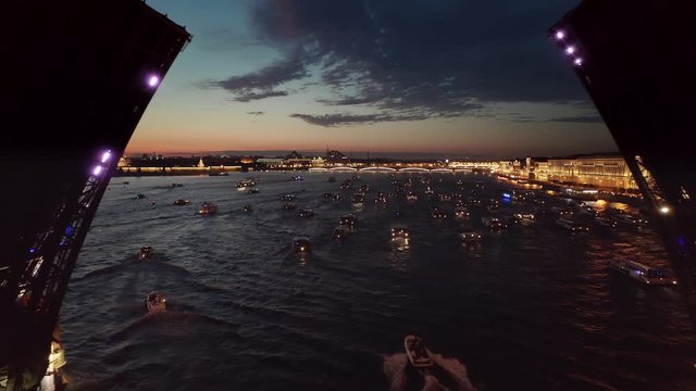 Flying under a drawbridge. Night St. Petersburg