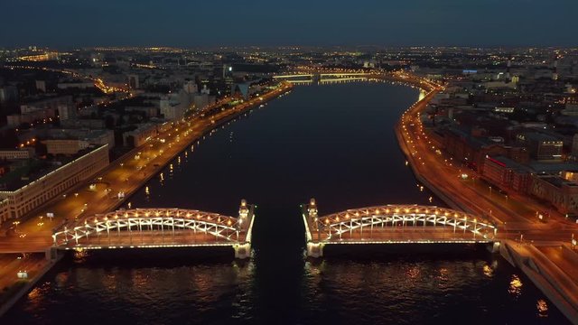 Aerial photography of St. Petersburg at night and drawbridges. Neva River.