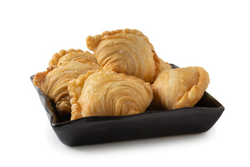 Homemade chicken Curry puffs isolated on white background.