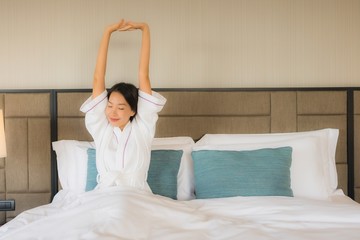 Fototapeta premium Portrait beautiful young asian women smile happy in bedroom