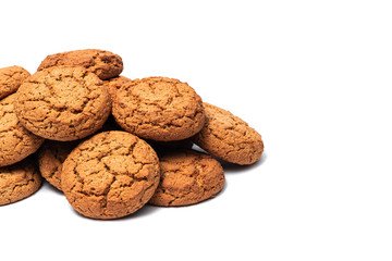 several oatmeal cookies on a white background with place for text