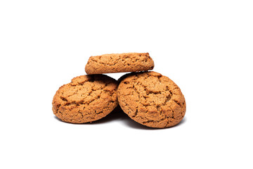 three oatmeal cookies on a white background
