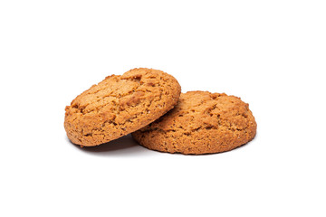 two oatmeal cookies on a white background