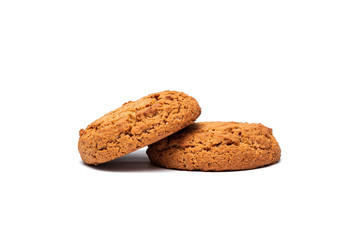 two oatmeal cookies on a white background