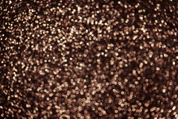 Bronze abstract bokeh background. Bronze Christmas texture.