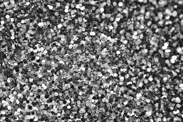 Confetti. Background black and white. Blur effect on part of the photo