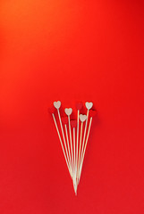 Trendy background for Valentine's day in p red color with hearts.