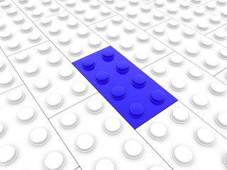 Blue toy brick among white toy bricks