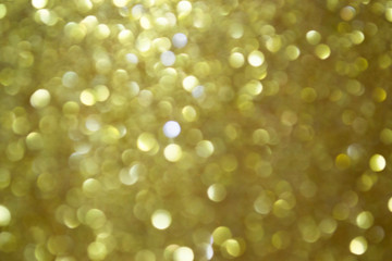 abstract golden texture with bokeh glitter 