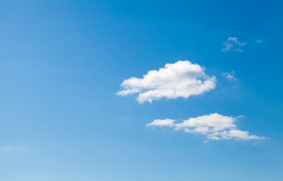 Group of small white clouds in blue sky, natural background