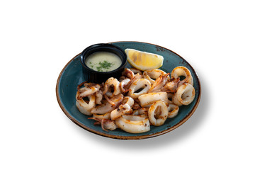 Fried calamari with lemon and dressing