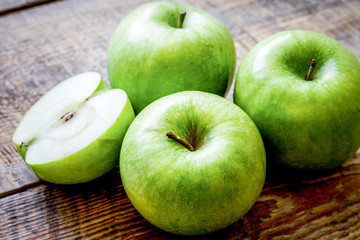 fresh organic green fruits with apples on rustic background