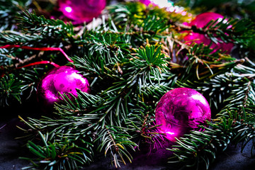 Christmas and New Year holiday, Christmas atmosphere, spruce branches with festive toys