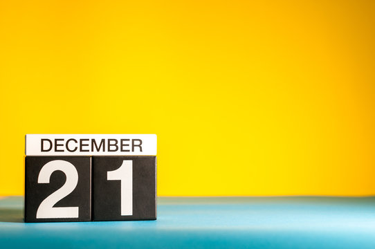 December 21st. Image 21 day of december month, calendar on yellow background with empty space for text