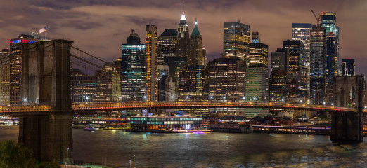 View of Brooklyn Bridge and Manhattan skyline in the morning, New York City, United States