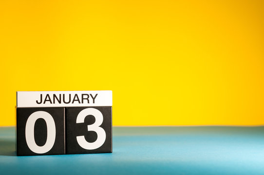 January 3rd. Day 3 of january month, calendar on yellow background. Winter time. Empty space for text