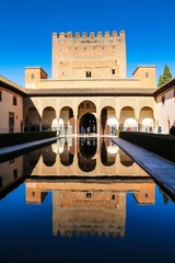 Fototapeta premium Reflections on the Myrtles Court Pool South Portico in the Alhambra Granada Spain