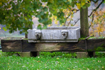 stone decorated trough