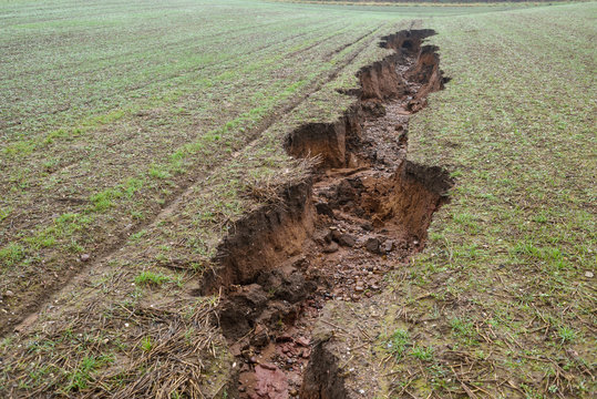 Sinkhole Soil Erosion in Farmland after heavy Rain on the Landscape in Nottinghamshire in the UK.