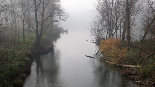 View of one of the corners hides the river Ges in Les Berdisas a foggy day, Torello, Osona, Catalunya, Spain