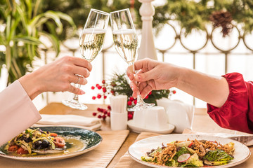 Celebration. People holding glasses of champagne making a toast