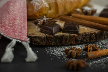 Morning croissant with chocolate and cinnamon