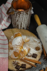 Morning croissant with chocolate and cinnamon