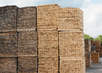 construction wooden planks stacked in a lumberyards