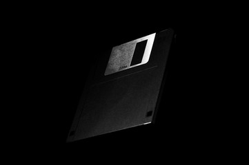 detail of 3.5 inch floppy disk on dark background - 310473418