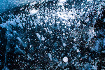 Ice texture on surface of frozen lake, nature background image