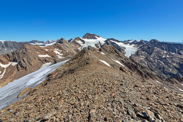 Barren alpine landscape with rocky mountains and glaciers. Oetztal Alps, South Tyrol, Italy