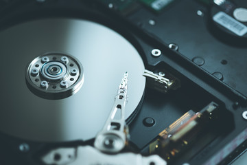 Storage, backup and cloud concept: Close up of hard disk drive
