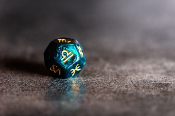 Astrology Dice with zodiac symbol of Libra Sep 23 - Oct 22 on dark background