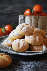 Winter baking. Homemade tangerine cookies, powdered sugar dressing