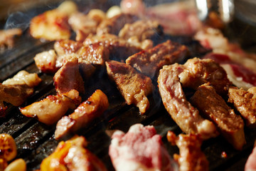 Korean BBQ, meat on iron plate 