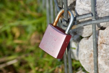 padlock on a fence