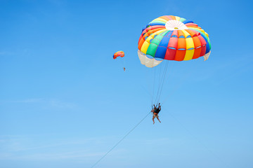 Colorful of the parachute floating in the sky