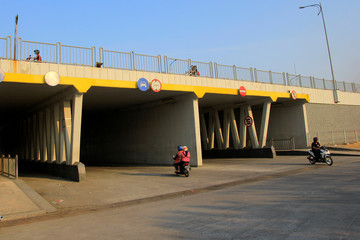 Surabaya, Indonesia, Oct 29, 2015. Crossing road or underpass under the flyover to facilitate...