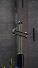 cross on garden of church