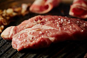 Korean BBQ, meat on iron plate 