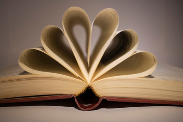 open book with folded pages close up