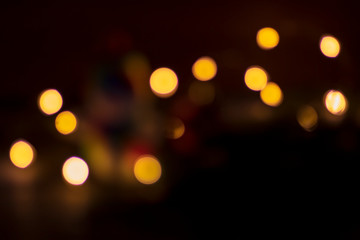 no focus, black background. lights, garland. single color.