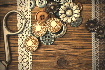 vintage buttons, lace, and a tailor scissors