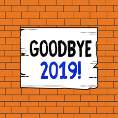 Text sign showing Goodbye 2019. Business photo text express good wishes when parting or at the end of last year Wooden square plank empty frame slots grooves wood panel colored board lumber