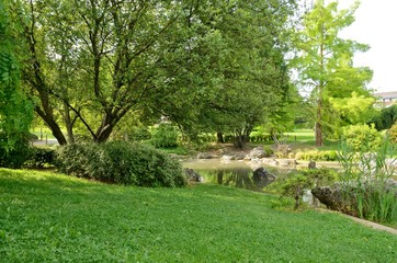 Pond in green park in Pamplona, Spain